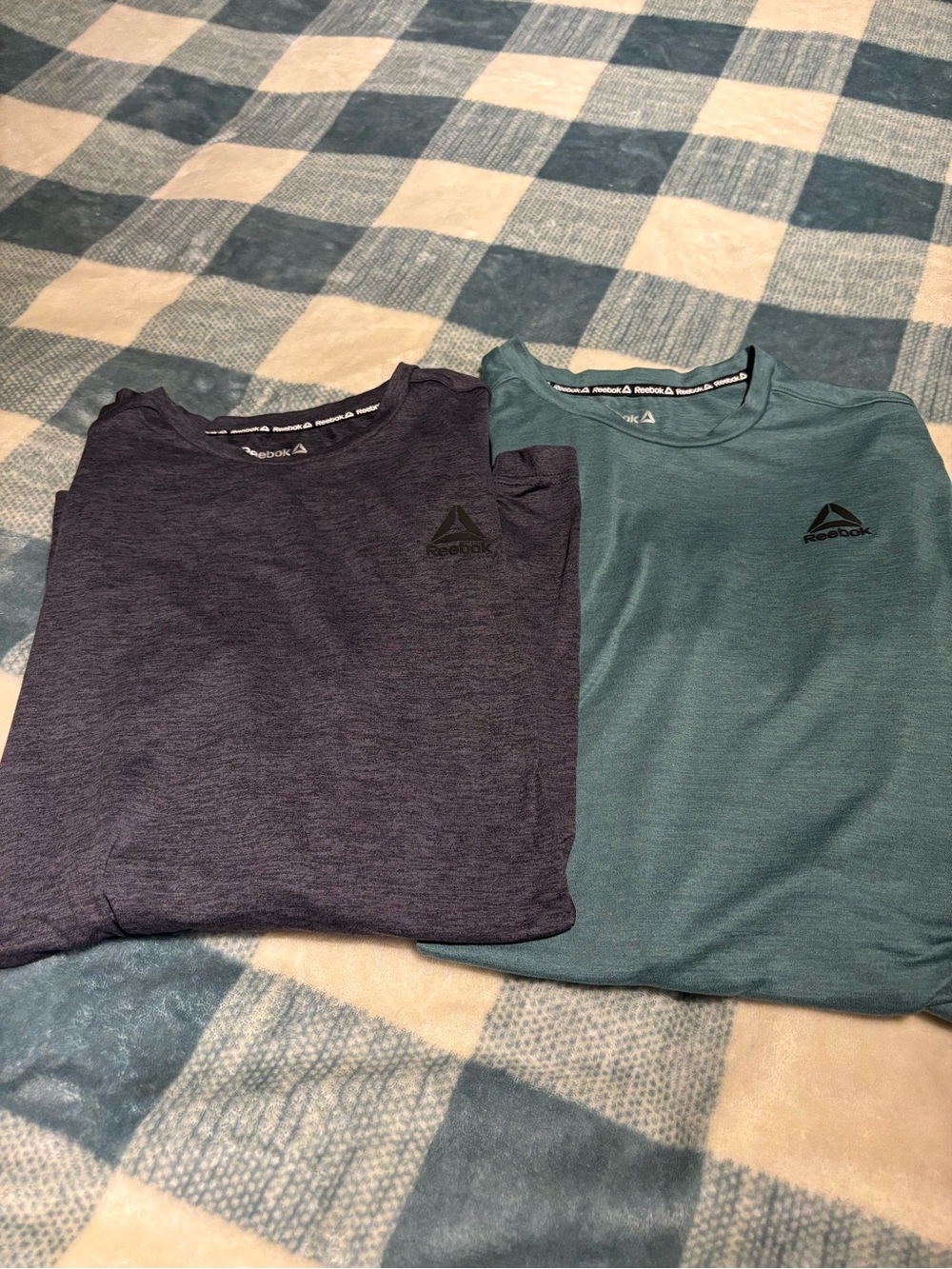 Men’s long sleeve Reebok shirts.